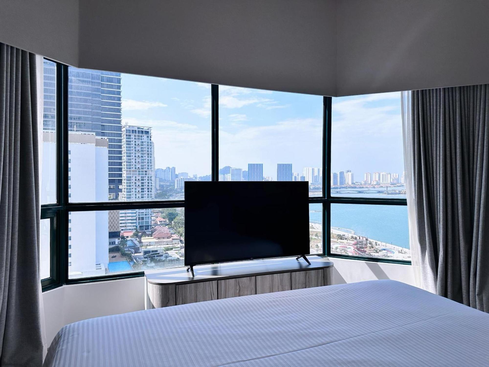 ذا جورني ريزورت هوتيل آند ريزيدنسز جورج تاون المظهر الخارجي الصورة A bedroom at the hotel